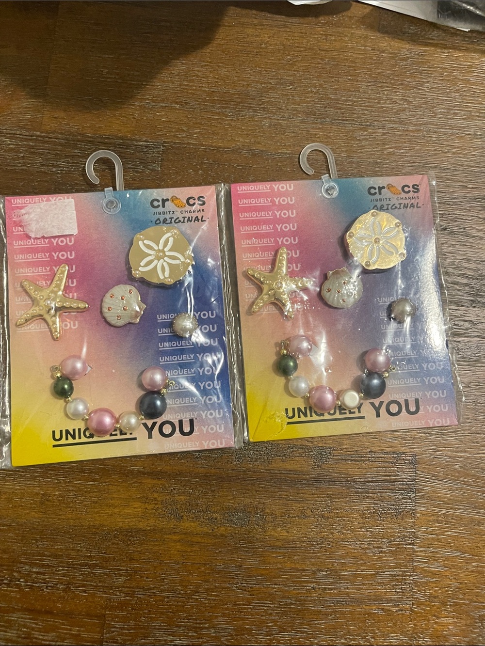 NWT 2 CROCS Pink and Gold Pearl Sea Charm Jibbitz Set